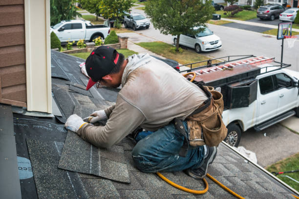Professional Roofing technician working in Springville, NY